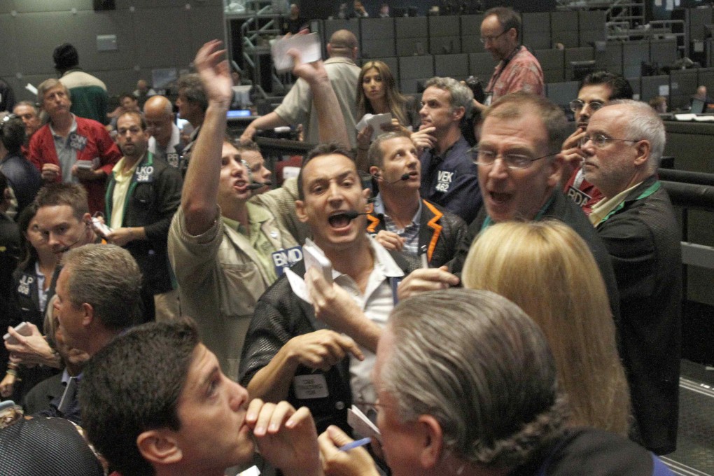 As recently as 2011, the Chicago Board of Trade trading pit was a SEETHING mass. Critics say online trading is killing one of the last bastions of shout-and-gesture trading. Photo: Reuters