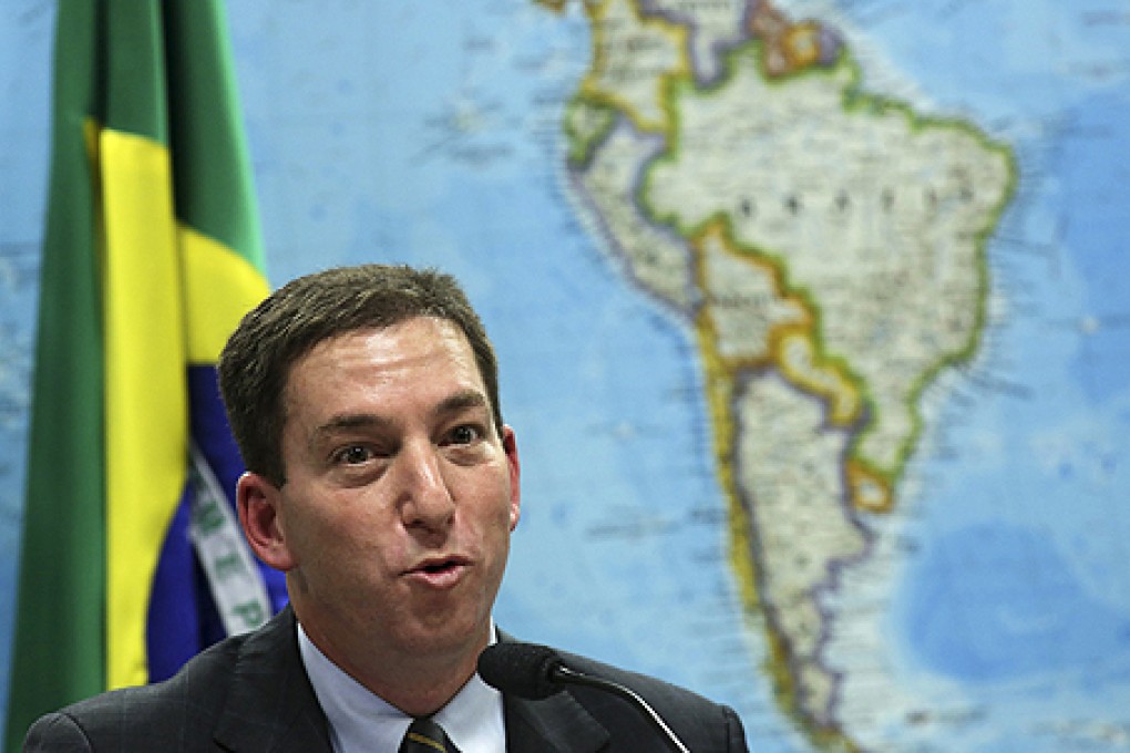 Guardian journalist Glenn Greenwald testifies before a Brazilian congressional committee on NSA's surveillance programmes. Photo: Reuters