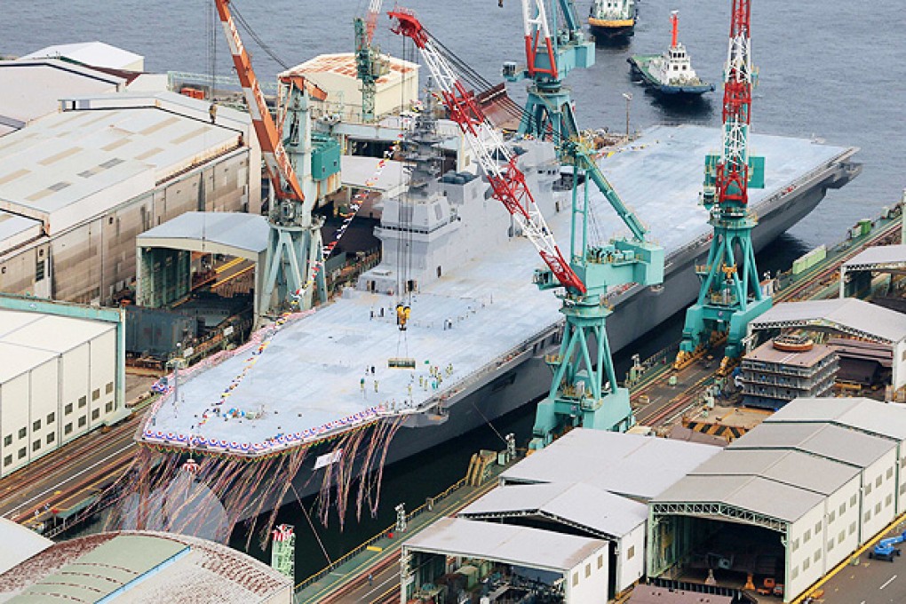 Japan's new destroyer, "Izumo", is unveiled in Yokohama. Photo: Reuters