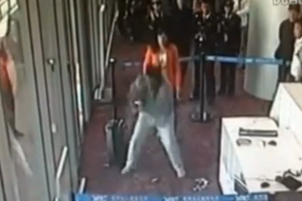 Yan Linkun's moment of rage went viral in China. Screenshot from security camera footage.