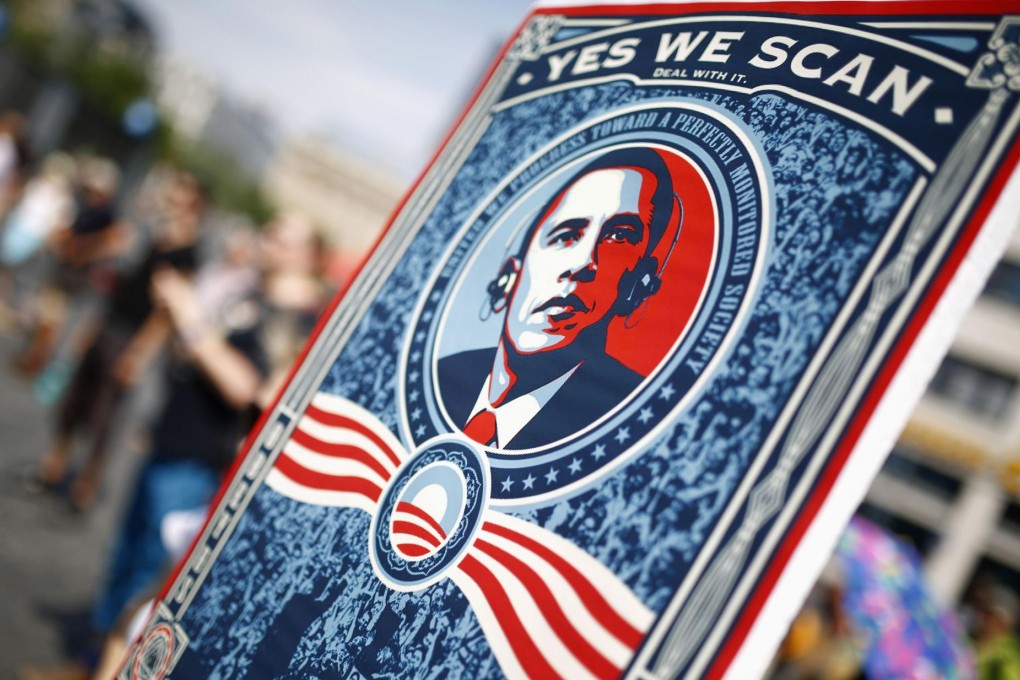 A German protester holds up a "Yes we scan" placard during a demonstration against the NSA in Frankfurt late last month.Photo: Reuters