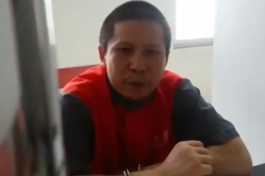 Xu Zhiyong appears in a video apparently smuggled out of prison and shared on Thursday.