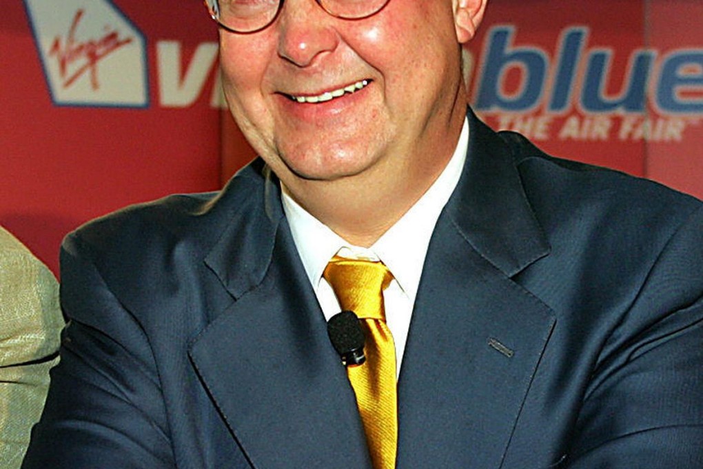 Kim Williams (left) and his successor Julian Clarke.