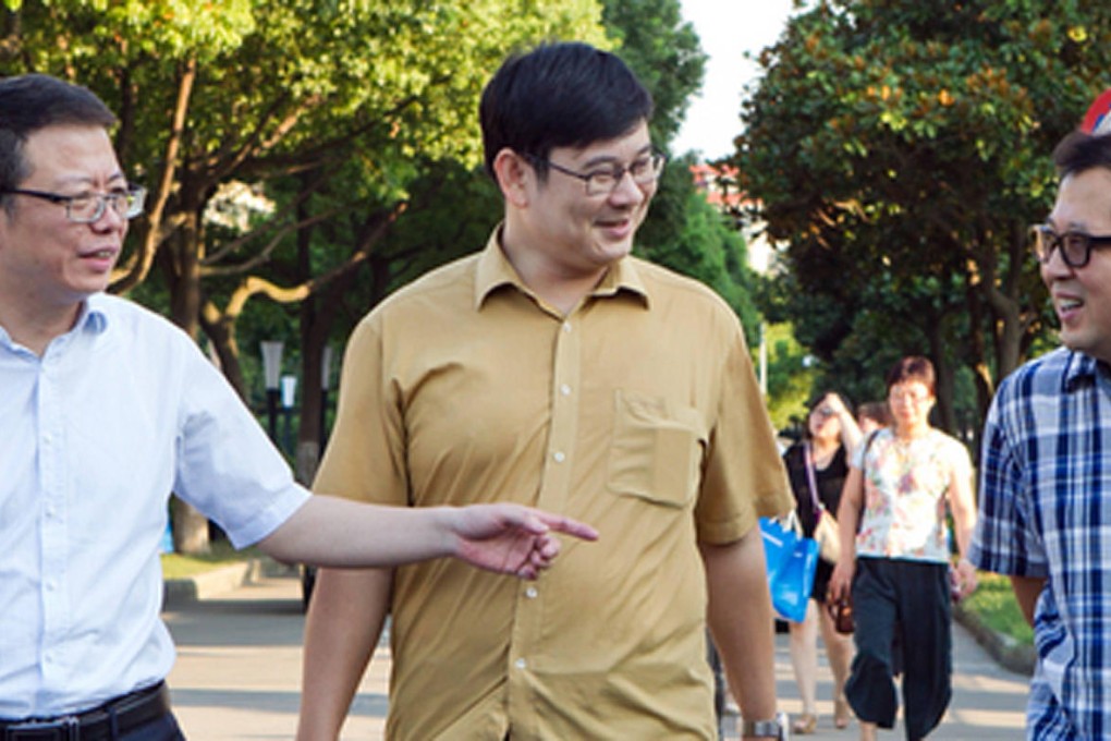 (From left) Li Ming, Lu Lei and Shao Nan have been given contracts for government posts in Fengxian district. Photo: SCMP
