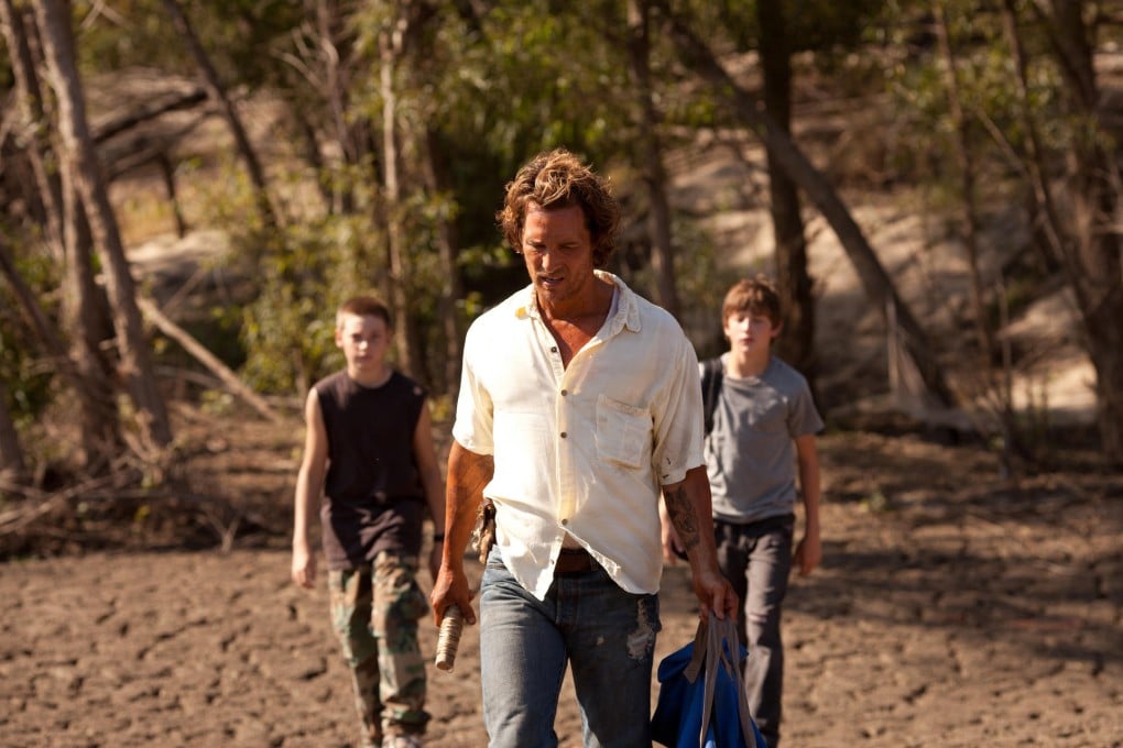 atthew McConaughey (centre) plays a soft-hearted fugitive who mentors two boys. Photos: Roadside Attractions