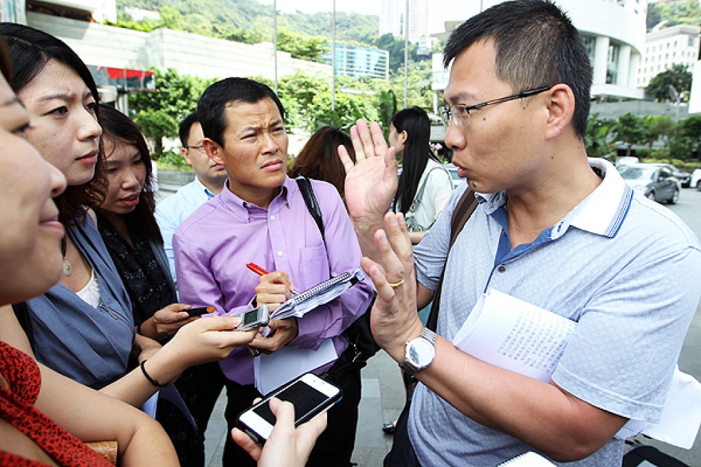 Li Jianjun talks to the media in Admiralty yesterday. Photo: Sam Tsang