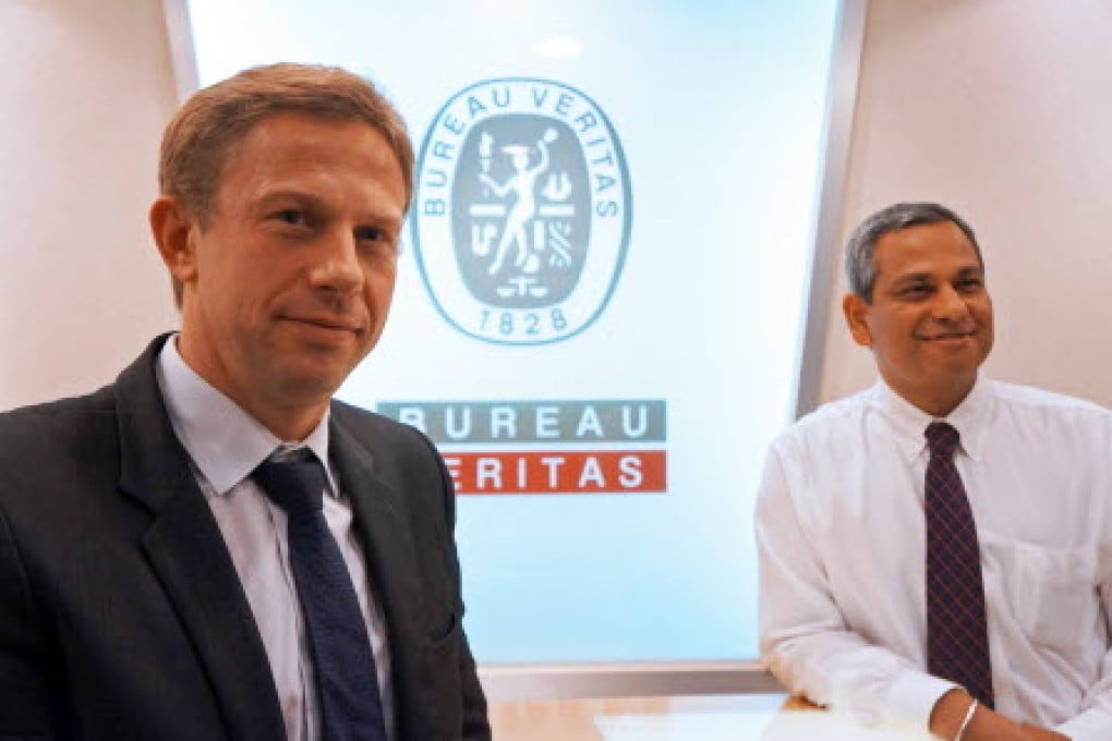 (From left) Romain Petit, executive vice-president, Asia Zone, industry and facilities division, and Rakesh Kumar, country CEO for Singapore, industry and facilities division