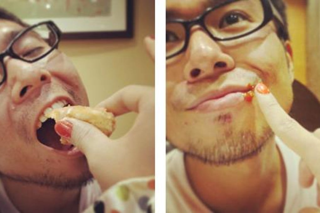 Japanese blogger Jinushi Keisuke gets coddled by his "girlfriend." Photo: Screenshot via Daily Portal Z