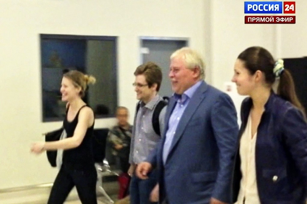 Edward Snowden leaves Sheremetyevo airport outside Moscow. Photo: AP