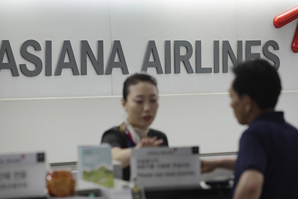 Asiana Airlines started offering an initial payment to help the 288 surviving passengers meet urgent medical expenses and other needs. Photo: Reuters