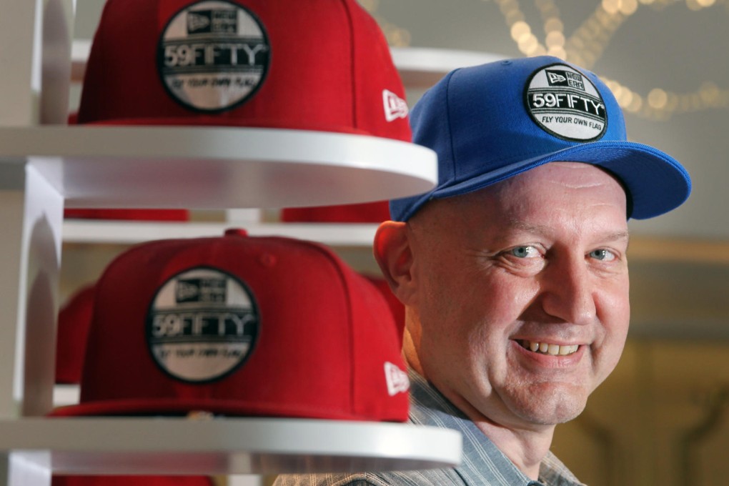 Daniel Broderick, New Era Cap's Asia chief, shows off one of the company's best-selling items, the 59FIFTY cap, in Hong Kong. Photo: May Tse