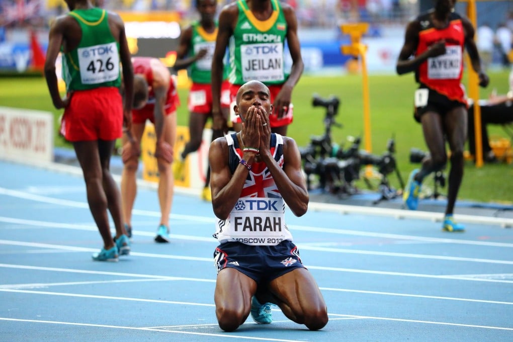 Mo Farah reacts with relief after winning the men's 10,000 metres at the world track and field championships in Moscow. Photo: EPA