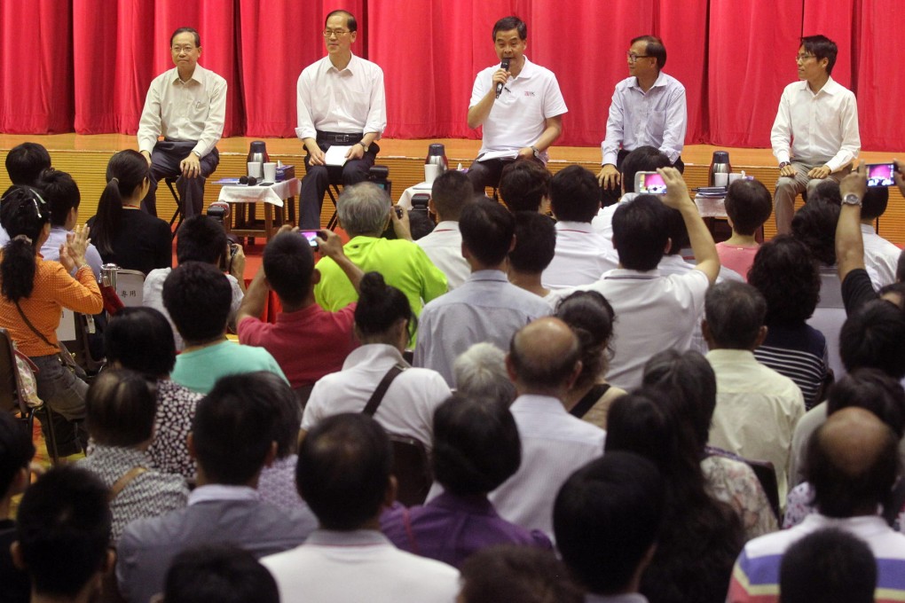Secretary for Security Lai Tung-kwok (left), Secretary for Home Affairs Tsang Tak-sing, Chief Executive Leung Chun-ying, Chairman of Yuen Long District Council Leung Che-cheung and Mak Chun-yu, district officer of Yuen Long. Photo: K. Y. Cheng