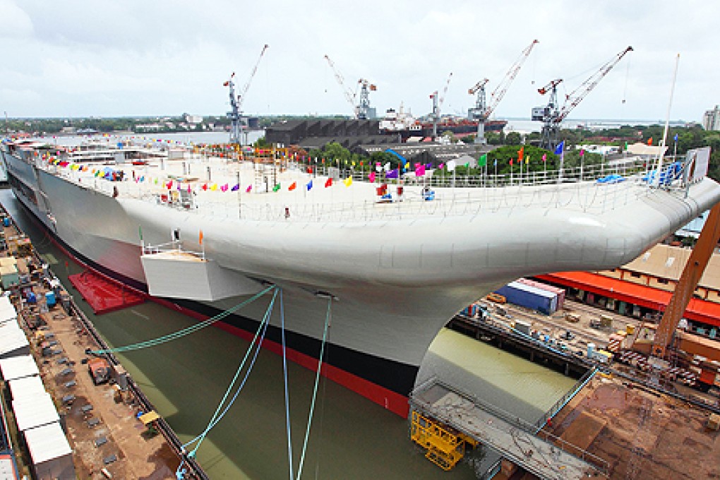 The aircraft carrier built by the Cochin Shipyard for the Indian Navy is docked at the Cochin Shipyard ahead of its formal launch on Monday at Kochi in Kerala, India. Photo: Xinhua