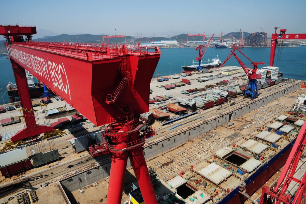 The mainland's top 10 builders accounted for 48 per cent of output in 2011, against Beijing's target of 70 per cent by 2015. Photo: AFP