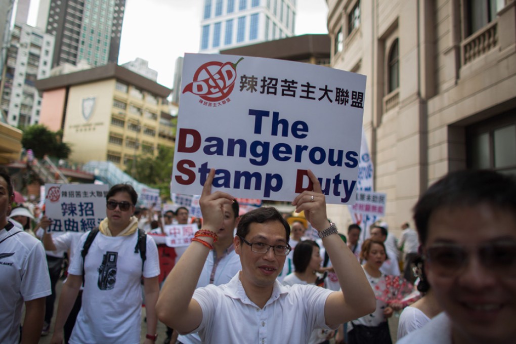 Property agents protest measures that have lost them income. Photo: Lam Yik-fei