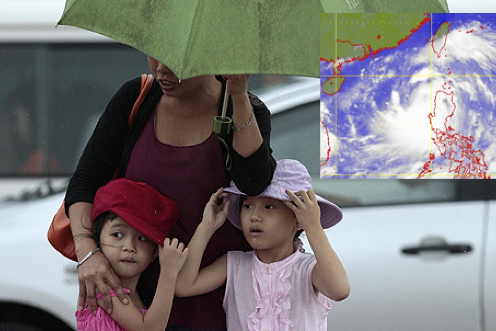 Hong Kong Observatory raises No 1 signal as Typhoon Utor batters Philippines