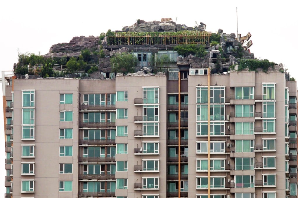 A view of the fake mountain and trees on top of the residential building in Beijing's upscale Park View estate. Photo: Simon Song