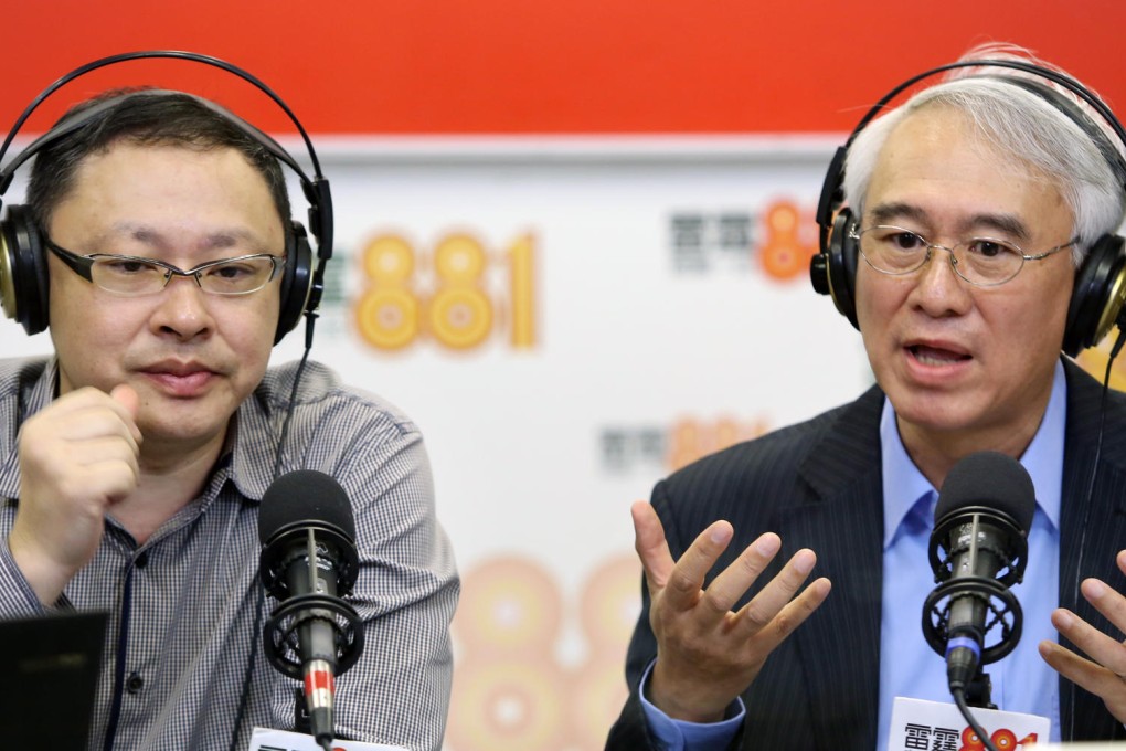 Occupy Central's Benny Tai Yiu-ting (left) engages in deep debate with Silent Majority's Robert Chow Yung on a radio programme yesterday. Photo: Sam Tsang