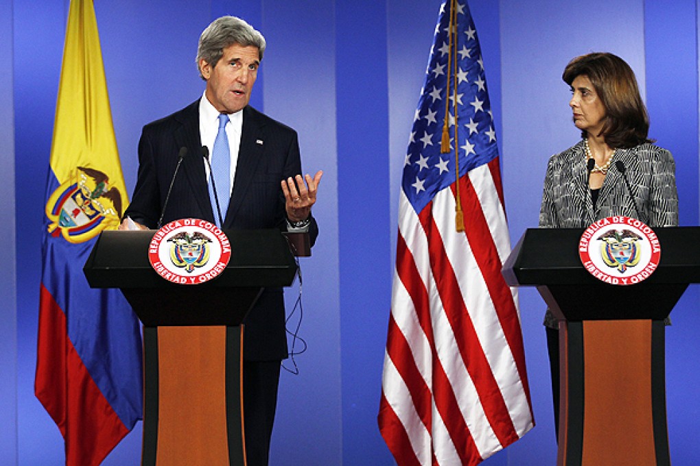 John Kerry and Colombia's Foreign Minister Maria Angela Holguin give a joint news conference at the Presidential Palace in Bogota. Photo: AP
