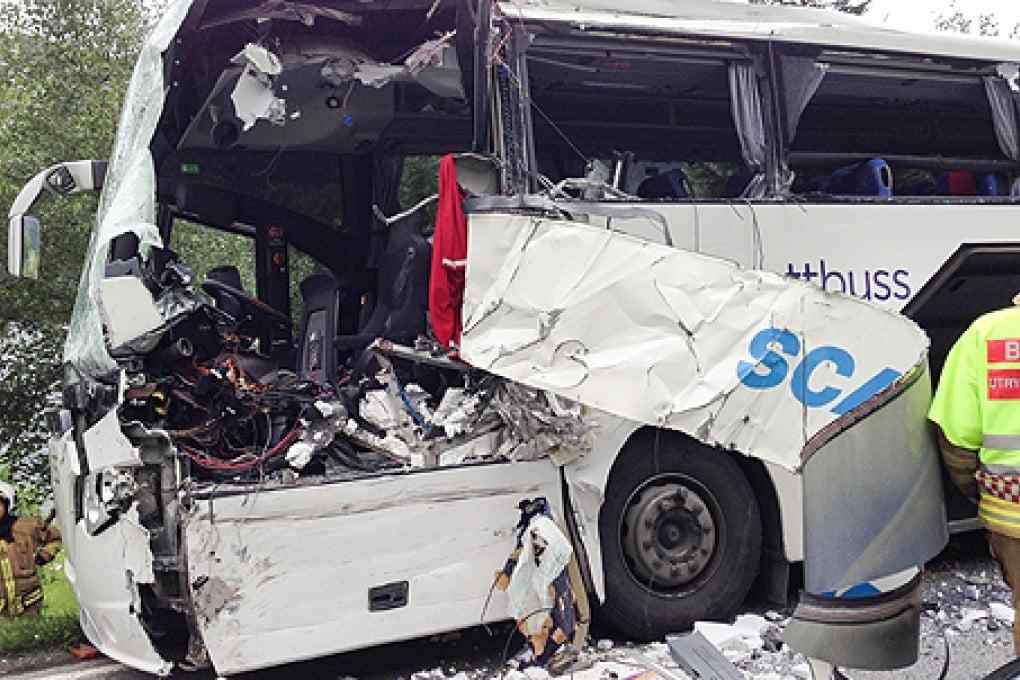 One of the buses after the collision in western Norway on Monday. Photo: EPA