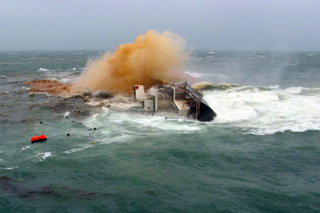 The Trans Summer goes down 80 kilometres southwest of Hong Kong yesterday. All 21 crew on board were rescued. Photo: SCMP
