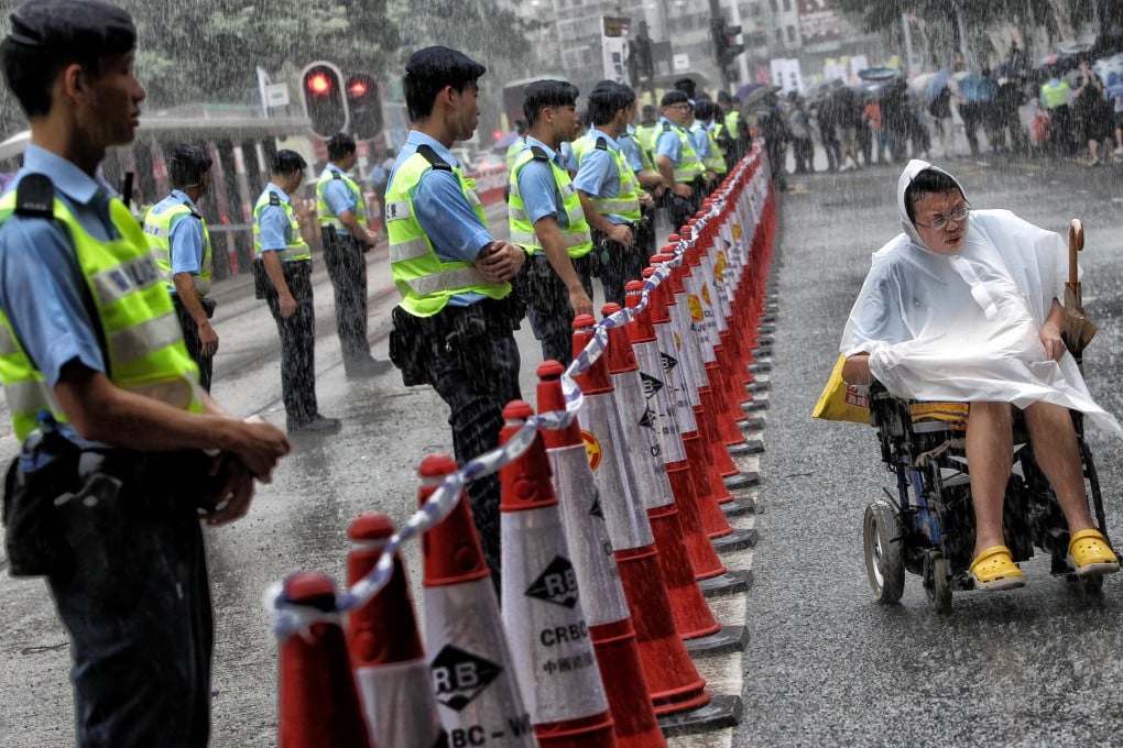 Officers at the annual July 1 march. Photo: David Wong