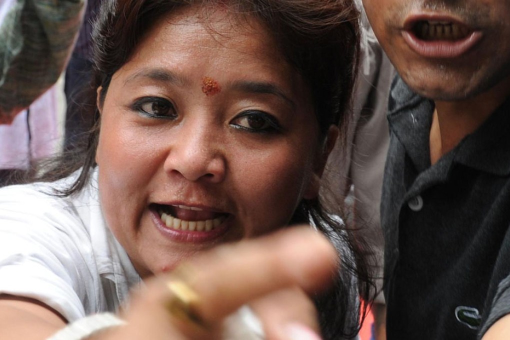 Gurkha activists shout slogans in New Delhi for a separate state. Photo: AFP