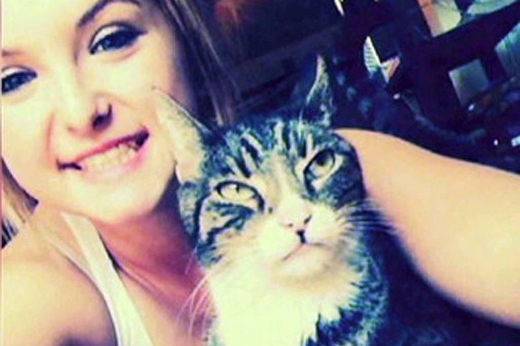 Hannah Anderson with the family cat. Photo: SCMP