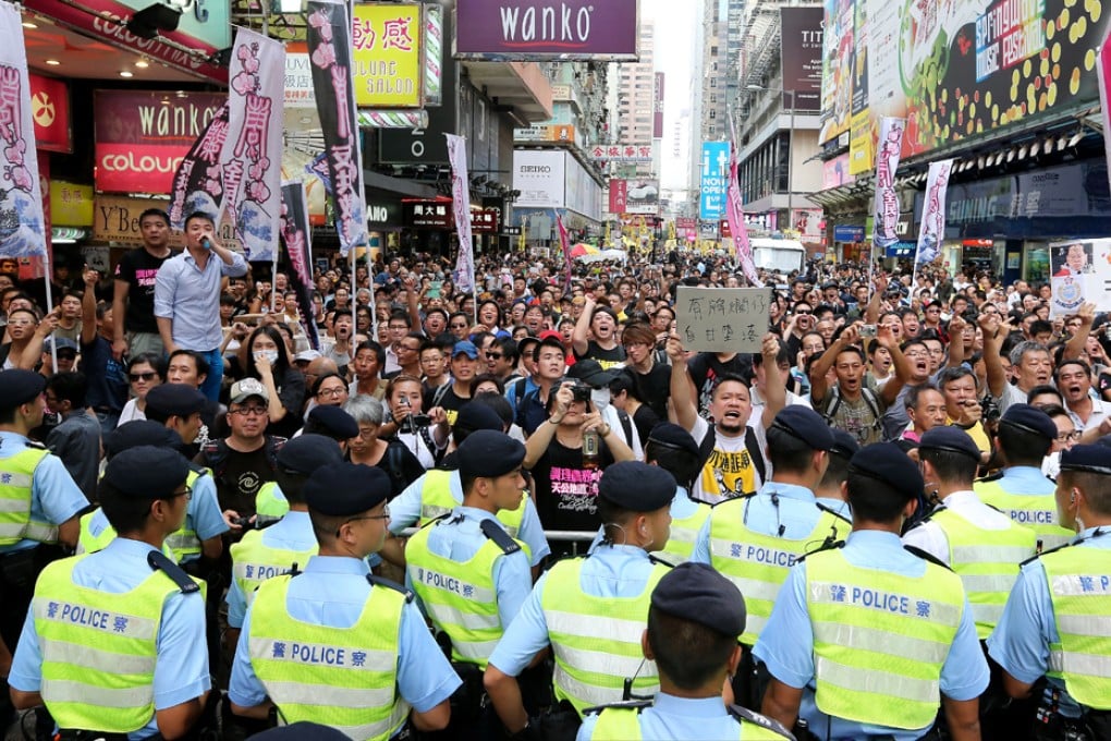 The August 4 rally in Mong Kok saw a stand-off between Alpais Lam's supporters and critics. Photo: Felix Wong