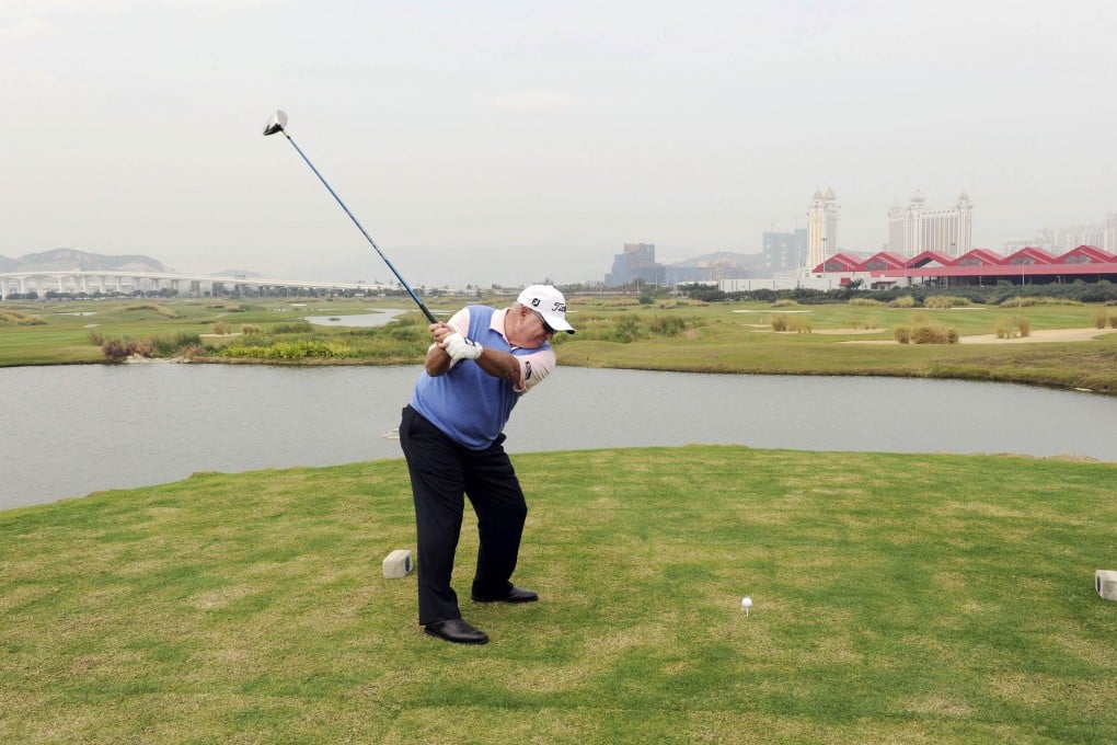 Butch Harmon plays a shot off the first tee at the course on the Cotai Strip. The course now faces redevelopment. Photo: Richard Castka