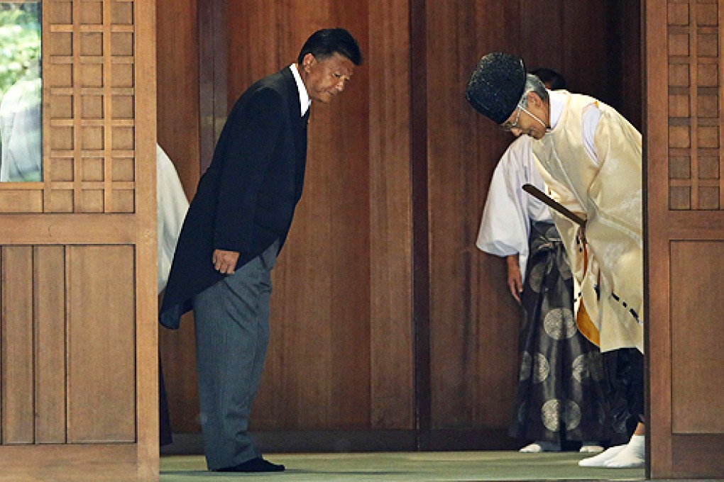 Japan's Internal Affairs and Communications Minister Yoshitaka Shindo leaves after visiting the Yasukuni Shrine in Tokyo. Photo: Reuters