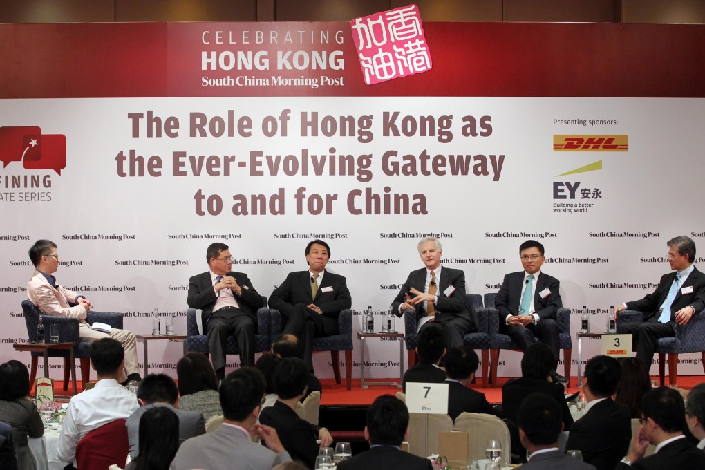 George Chen of the South China Morning Post chairs the debate on the future of Hong Kong featuring (from left) Albert Ng, Benjamin Hung, John Slosar, Chan Ka-keung and Vincent Lo. Photo: K.Y. Cheng