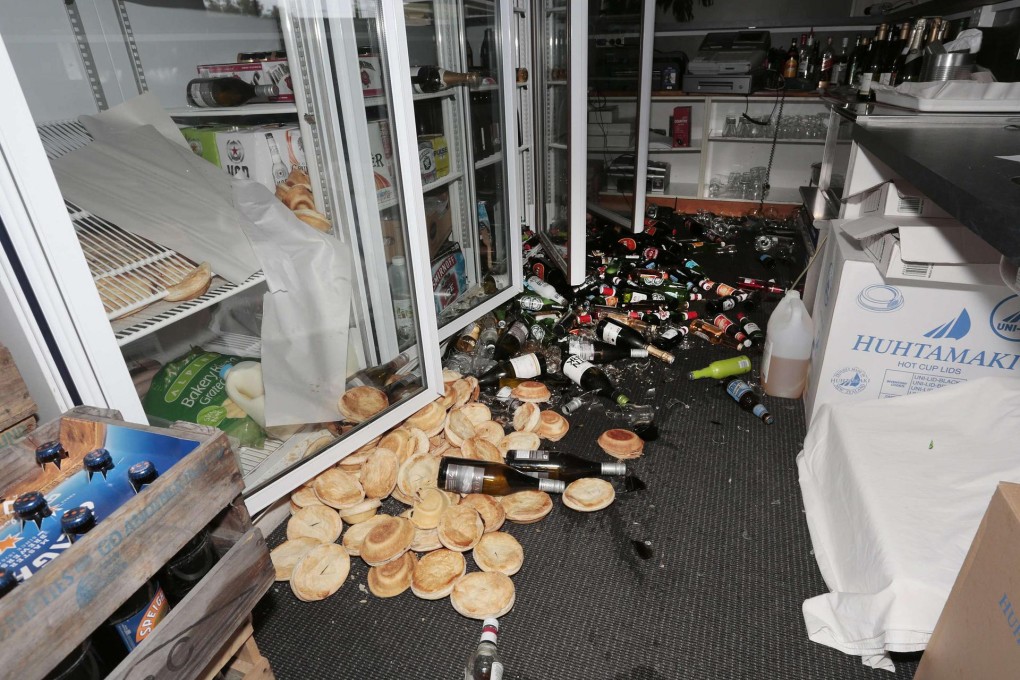Goods shaken off a store's shelves. Photo: Reuters