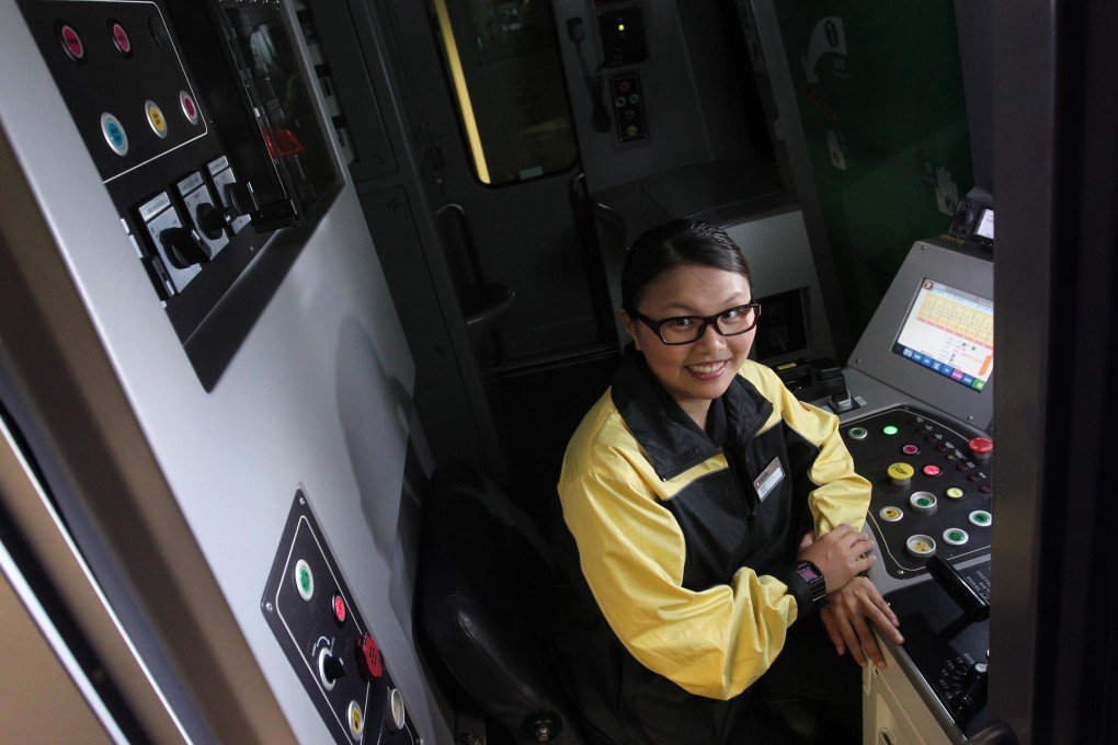 Gigi Yu at the controls of a train simulator at MTR Corp headquarters in Kowloon Bay. Photo: May Tse