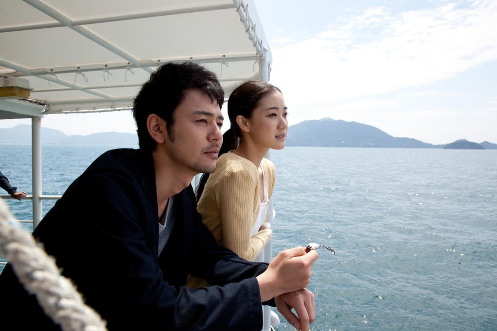 Satoshi Tsumabuki and Yu Aoi in a scene from Yoji Yamada's Tokyo Family.
