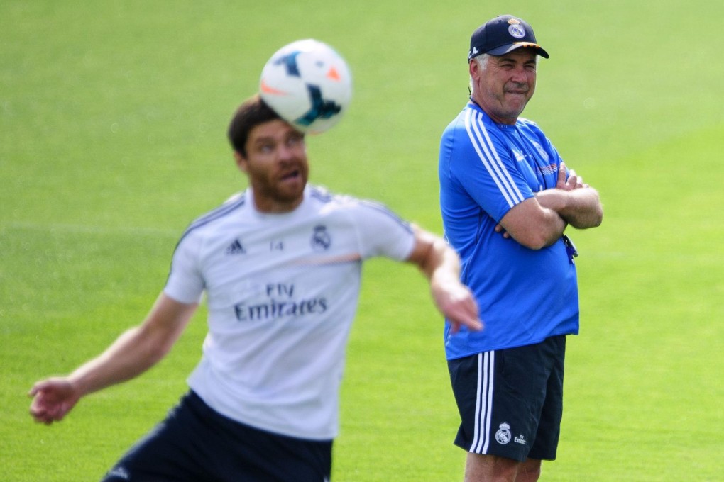 Coach Carlo Ancelotti keeps a close eye on the activity of his players at Real Madrid's training in Madrid this week. Photo: AFP