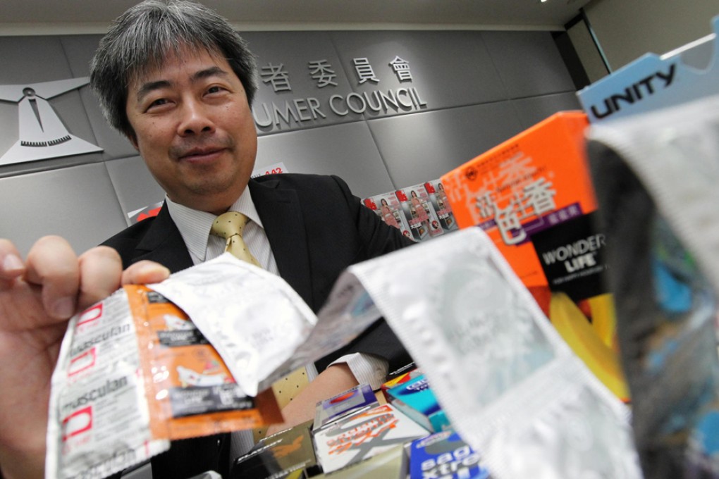 The Consumer Council's Philip Leung presents the condom brands it tested. Photo: Dickson Lee