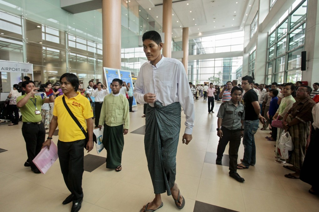 Win Zaw Oo arrives at Yangon International Airport. Photo: EPA