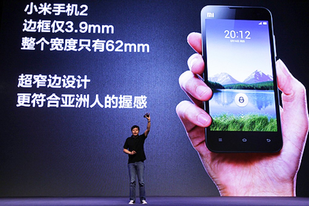 Lei Jun, founder and chief executive of Xiaomi, speaks at a launch ceremony of Xiaomi Phone 2 in Beijing in 2012. Photo: Reuters