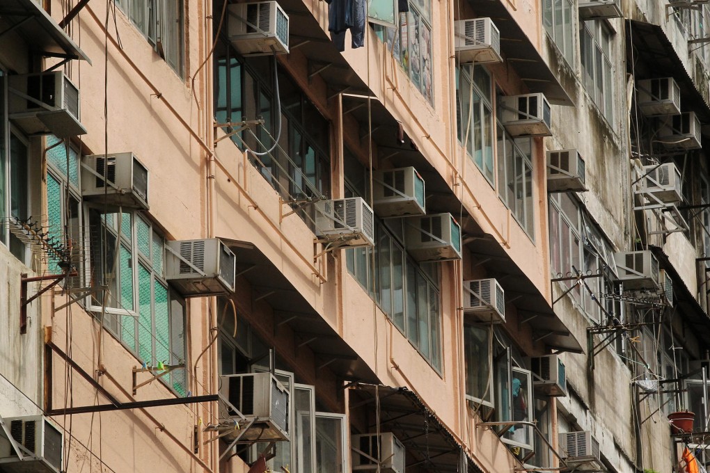 Air-conditioners provide needed comfort in Hong Kong's concrete jungle, but can drip on pedestrians below. Photo: K. Y. Cheng