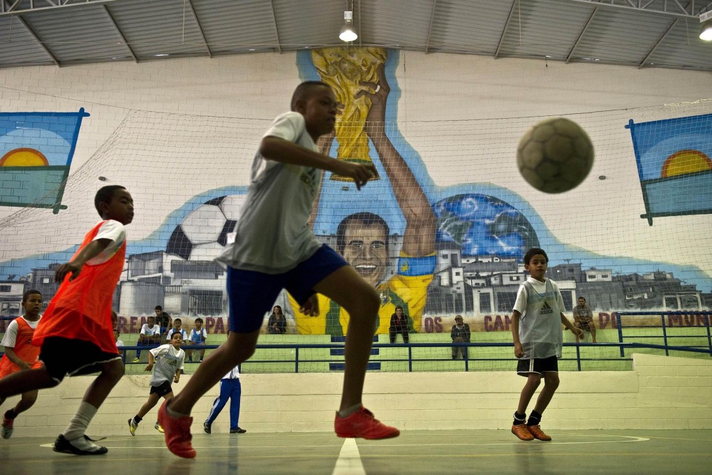 Teenagers hone their skills at the soccer academy in Sao Paulo that is partly funded by Brazil legend Cafu. Photo: AFP