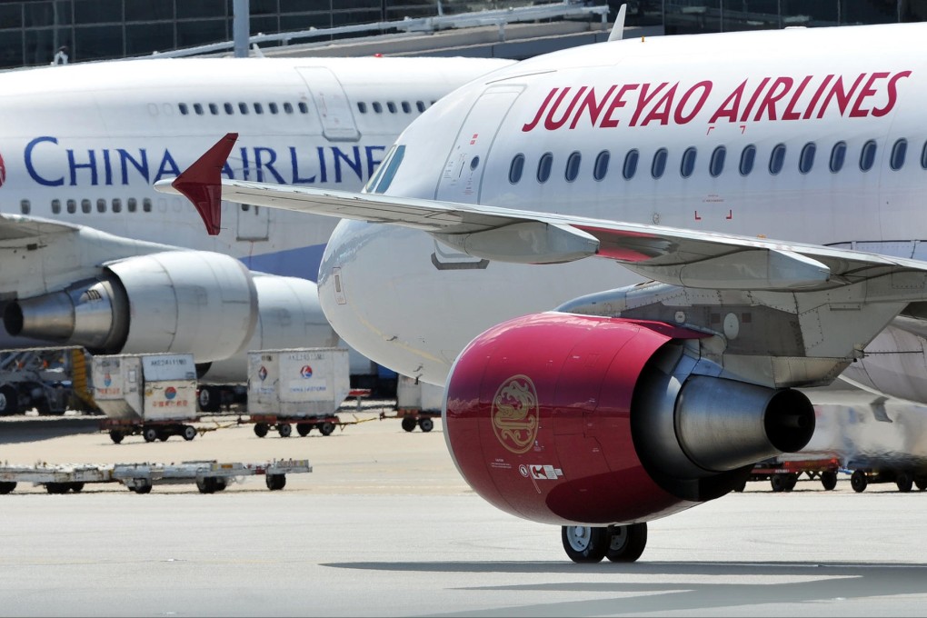 Juneyao Group runs airlines and dairy businesses. Photo: AFP