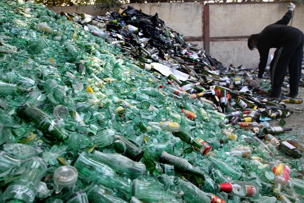 Recycled glass bottles are crushed into glass sand which is mixed with fly ash from power plants and some other construction waste products to form bricks.