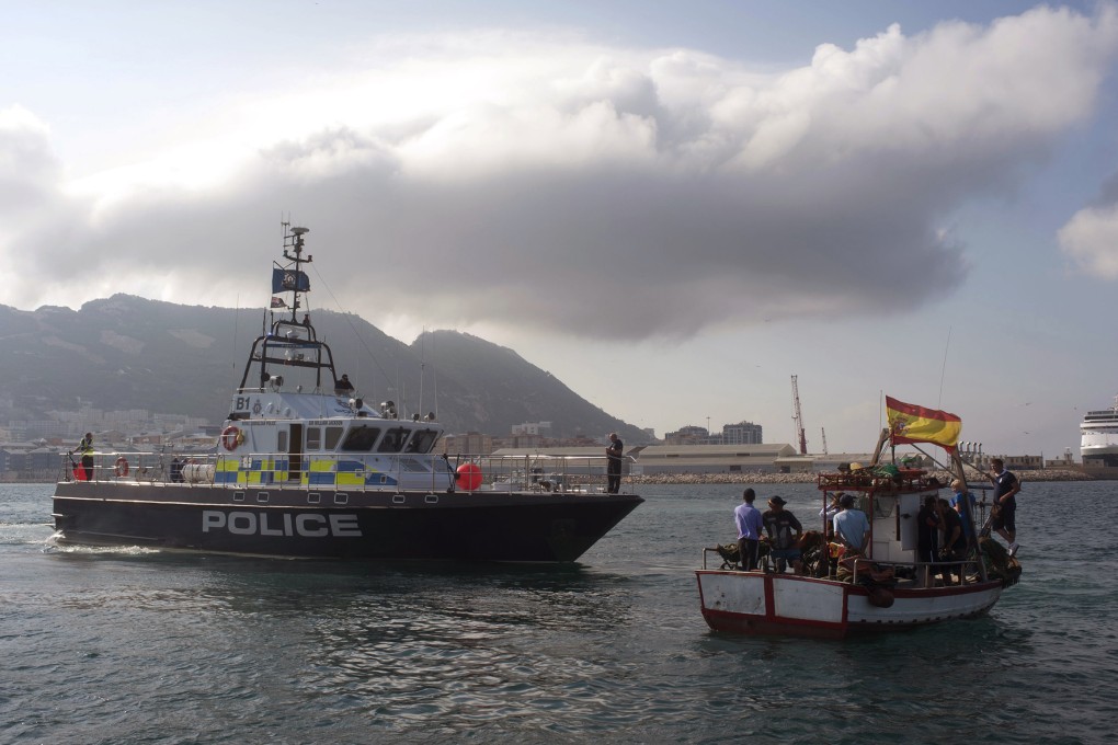 A British patrol boat blocks access as fishermen protest near to La Linea de la Concepcion in front of Gibraltar. Photo: AP