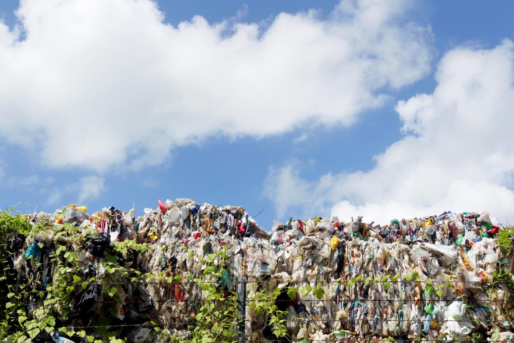 Plastic waste piles up in Tuen Mun. More than 100,000 tonnes has accumulated across the New Territories since the mainland cracked down on imports of unprocessed waste.