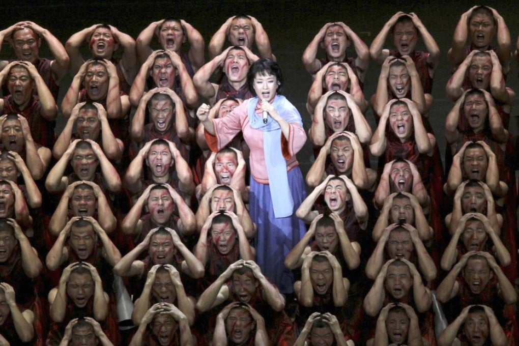 People's Liberation Army soldiers perform a musical drama as part of celebrations for the 60th anniversary of the founding of Communist China. Photo: Reuters