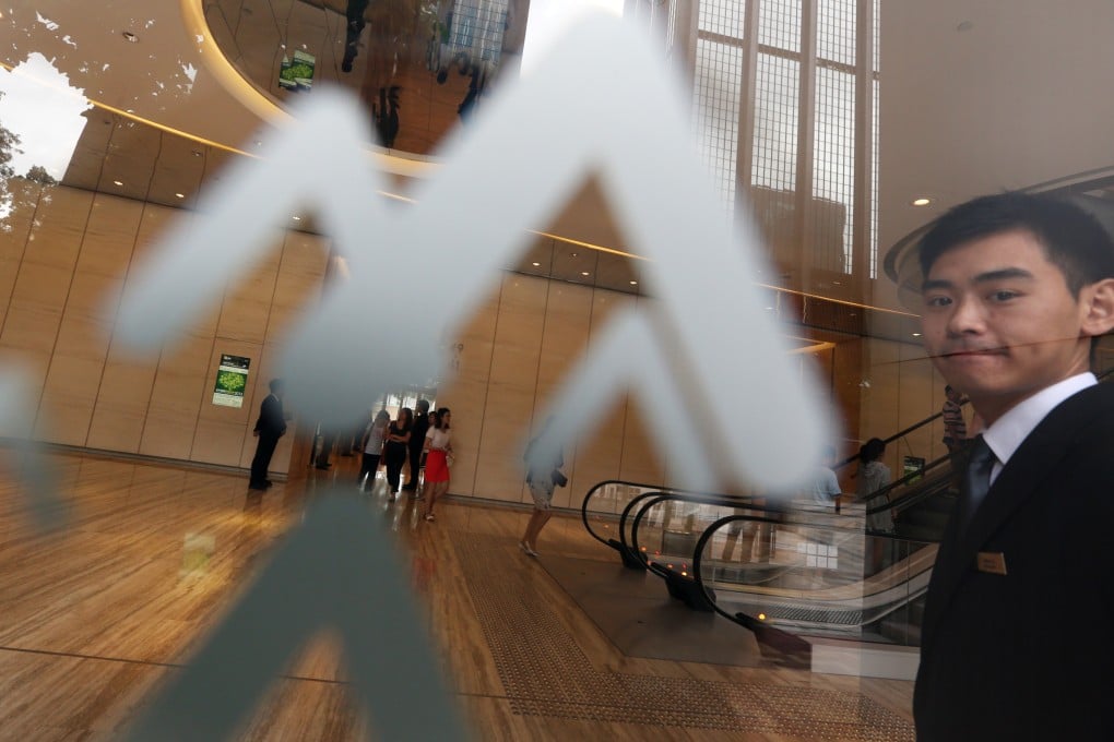 Shareholders attend an extraordinary meeting for China Resources Power Holdings in Hong Kong. The electricity generator has been accused of deliberately overpaying for coal assets in 2010. Photo: SCMP