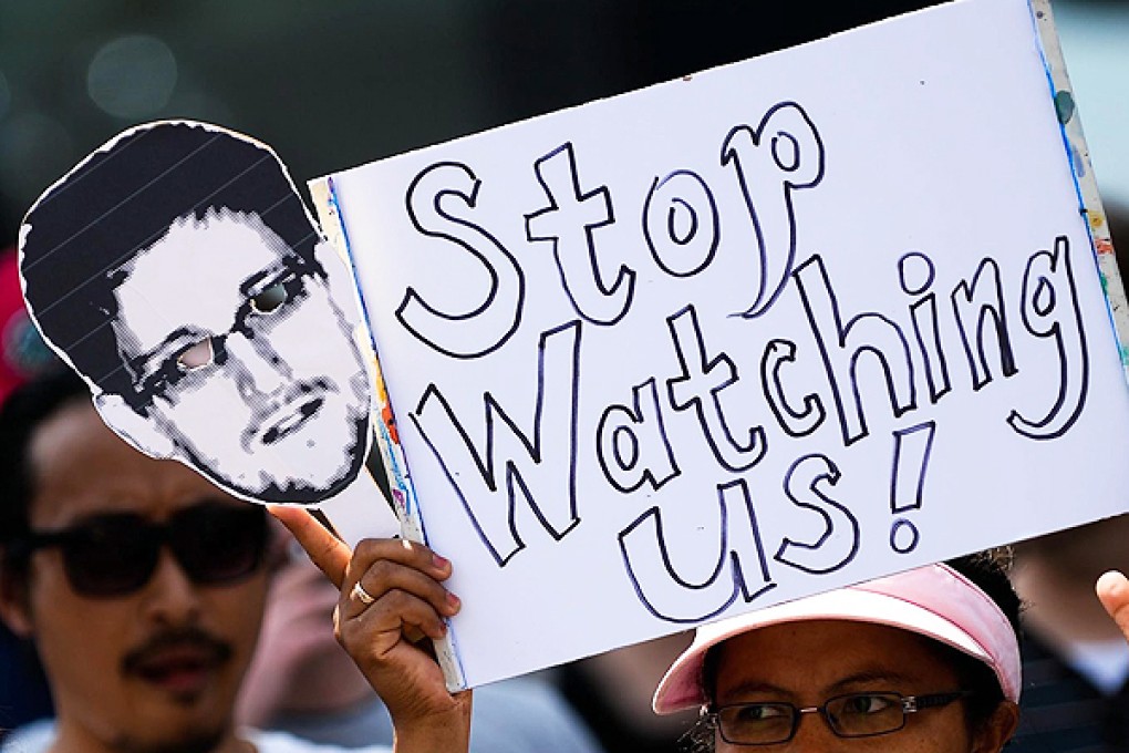 Demonstrators protest against the PRISM surveillance programme by the US National Security Agency (NSA) in Hanover, Germany. Photo: EPA