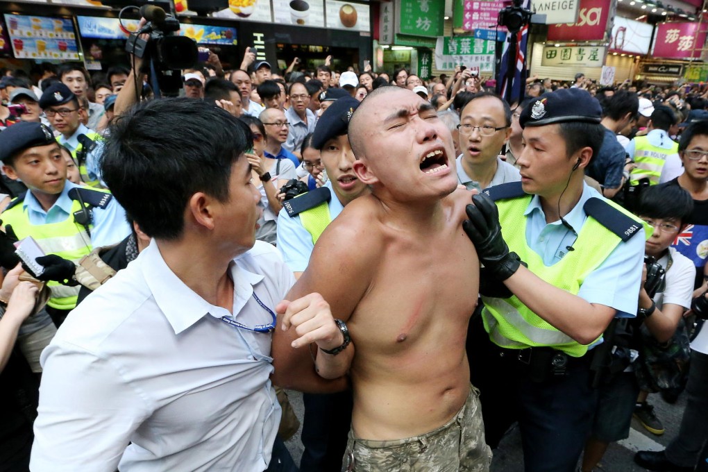 A supporter of Alpais Lam at a rally. Photo: Felix Wong